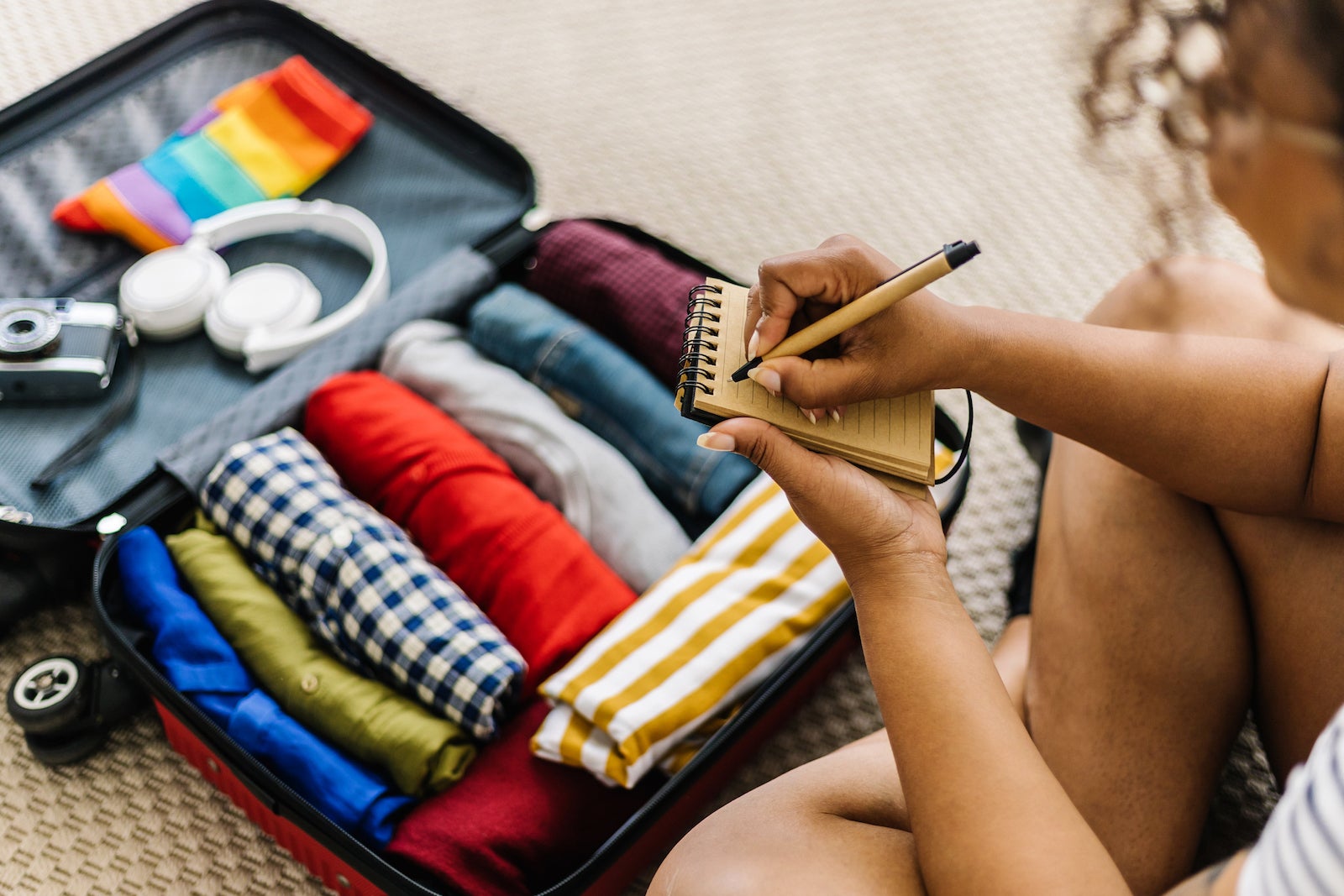 Here’s how I pack light when traveling with my family