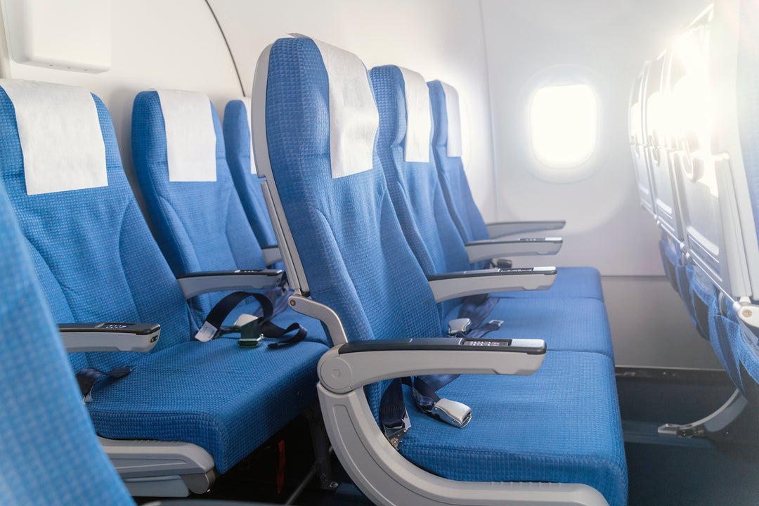 Airplane seat reclining etiquette: Is it OK to lean your seat back on a ...