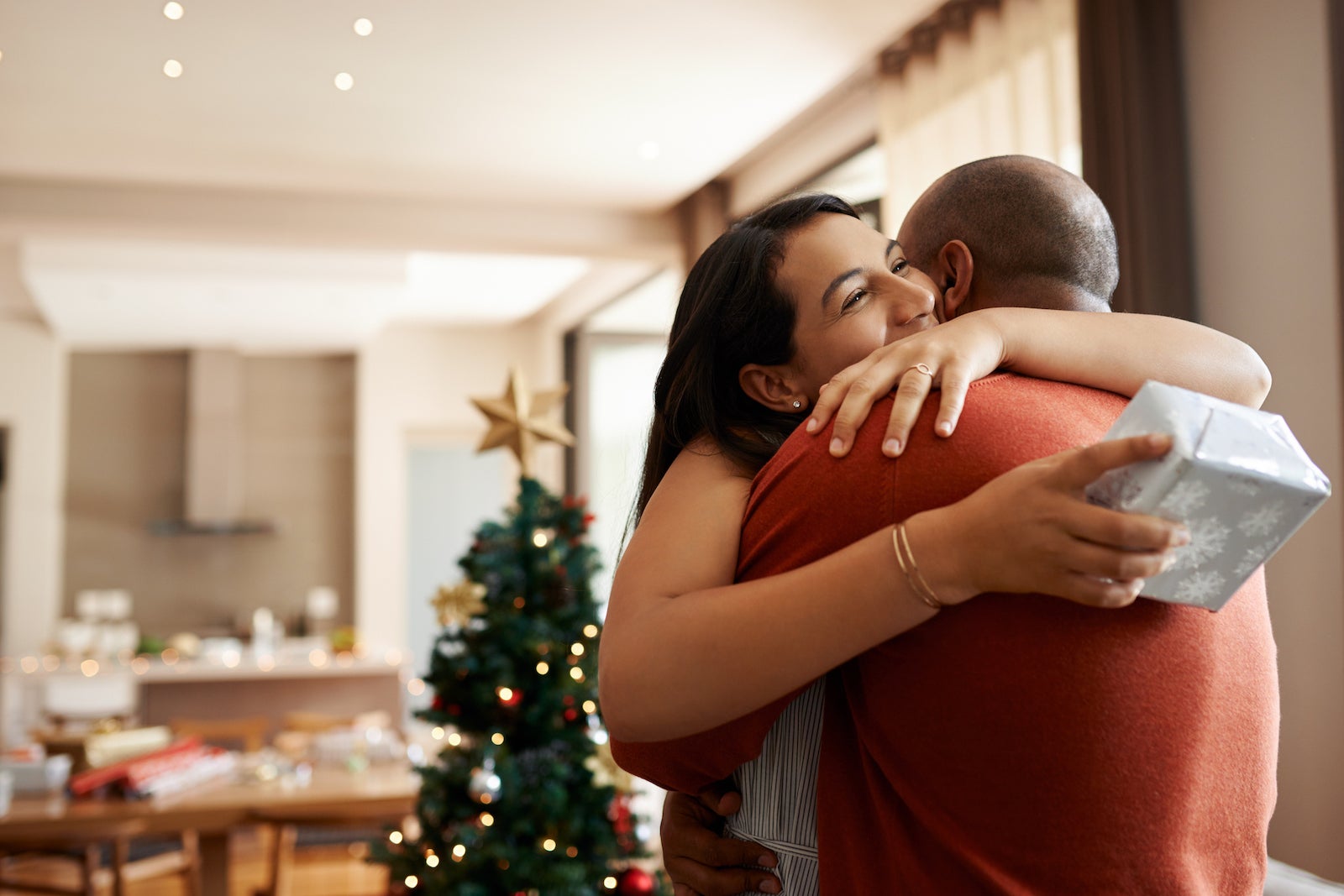 a couple hugs after exchanging Christmas gifts