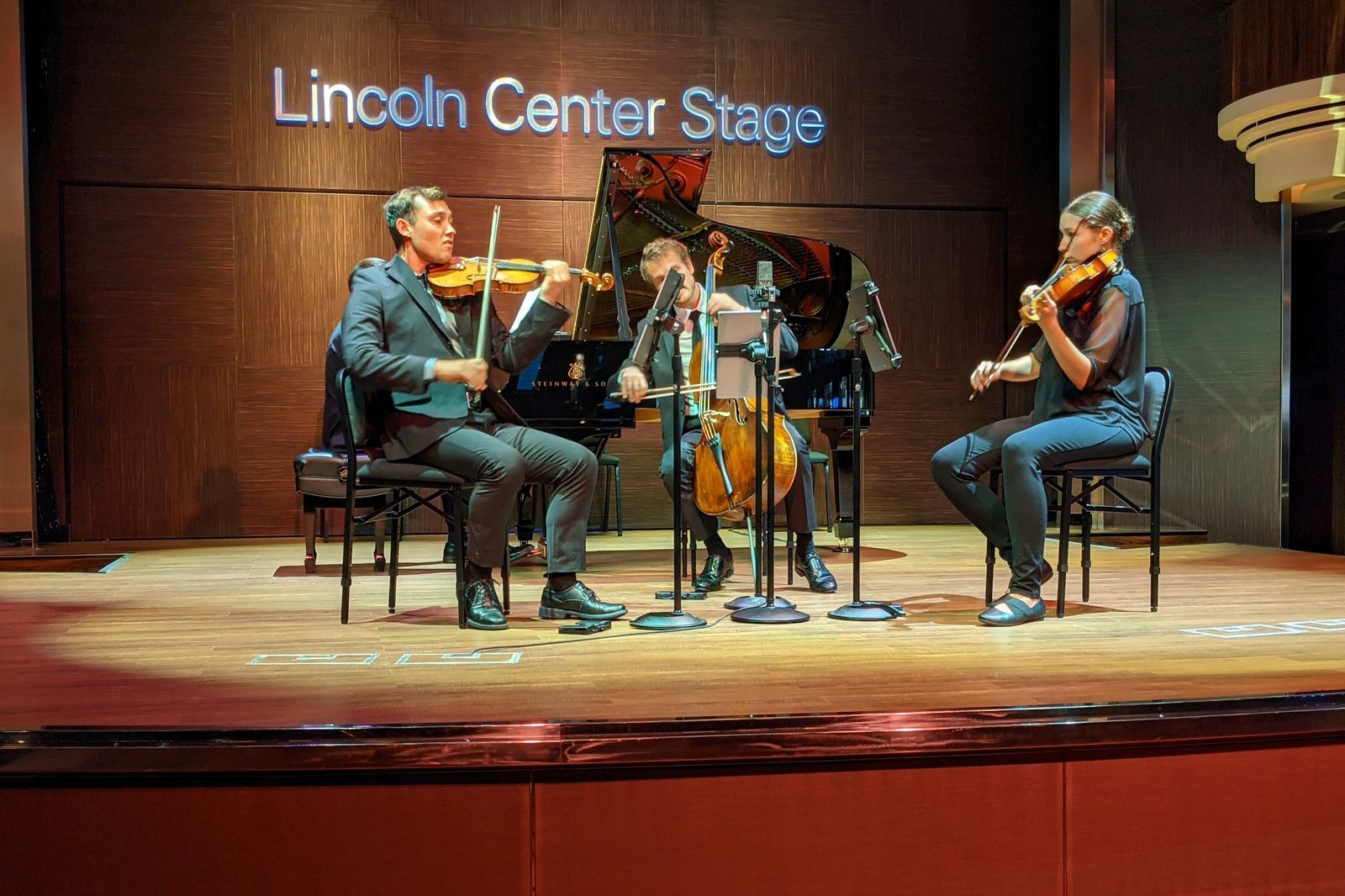 Piano quartet plays on cruise ship stage