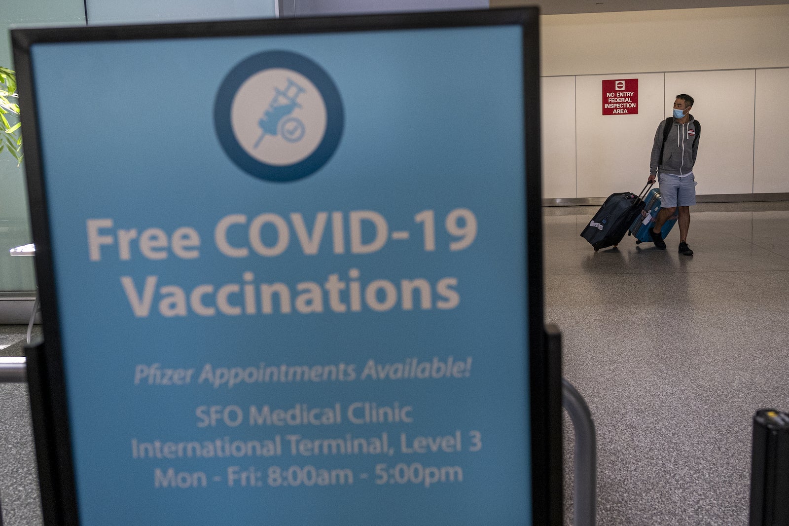Pressure mounts on Biden to drop vaccination requirement for incoming travelers