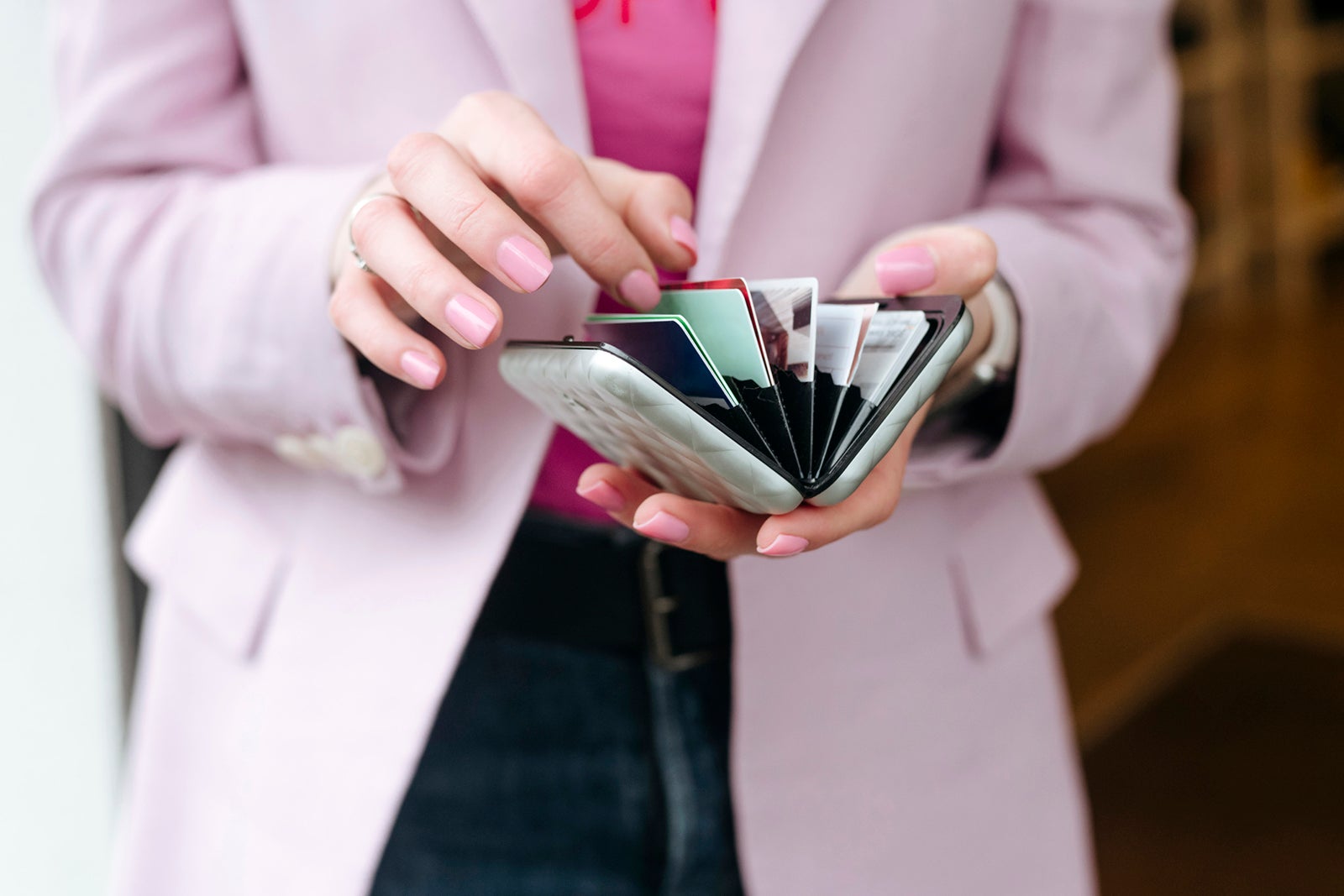 Woman's hands with cardholder