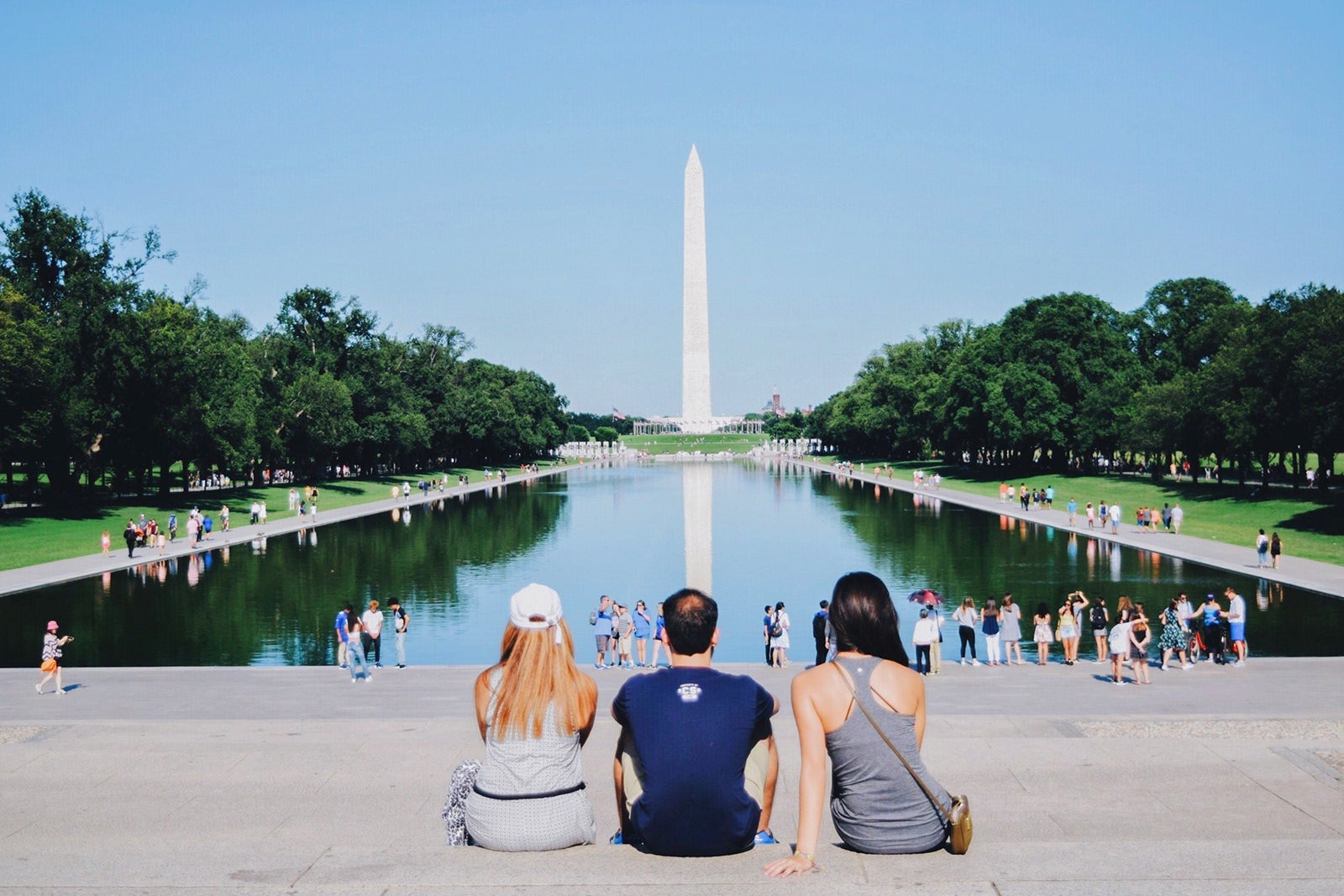 People Against Reflecting Pool And Washington Monument