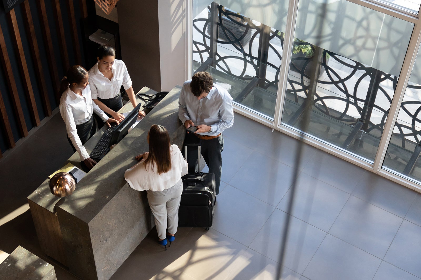 Hilton Surpass vs. Hilton Amex: Is $150 Extra for Premium Benefits Worth It for Travelers?