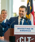 DOT Sec. Pete Buttigieg is a points and miles fan — but he tells TPG he turns down the free upgrades