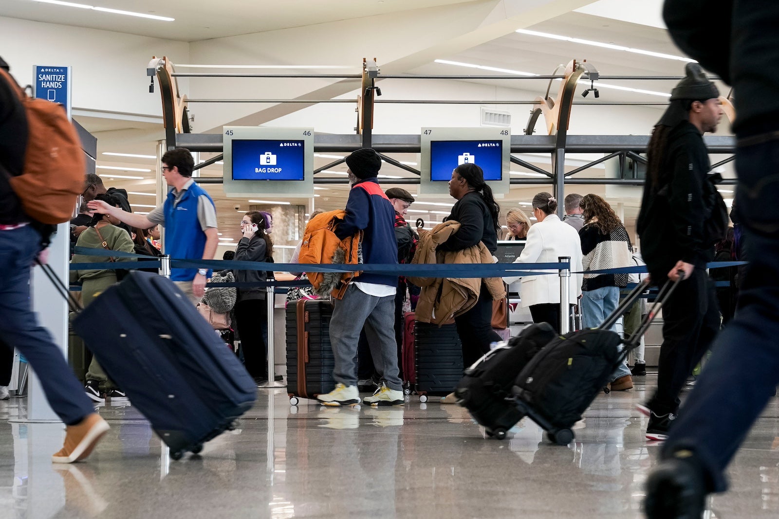 Travelers At Hartsfield-Jackson Atlanta International Airport Ahead Of Thanksgiving Holiday