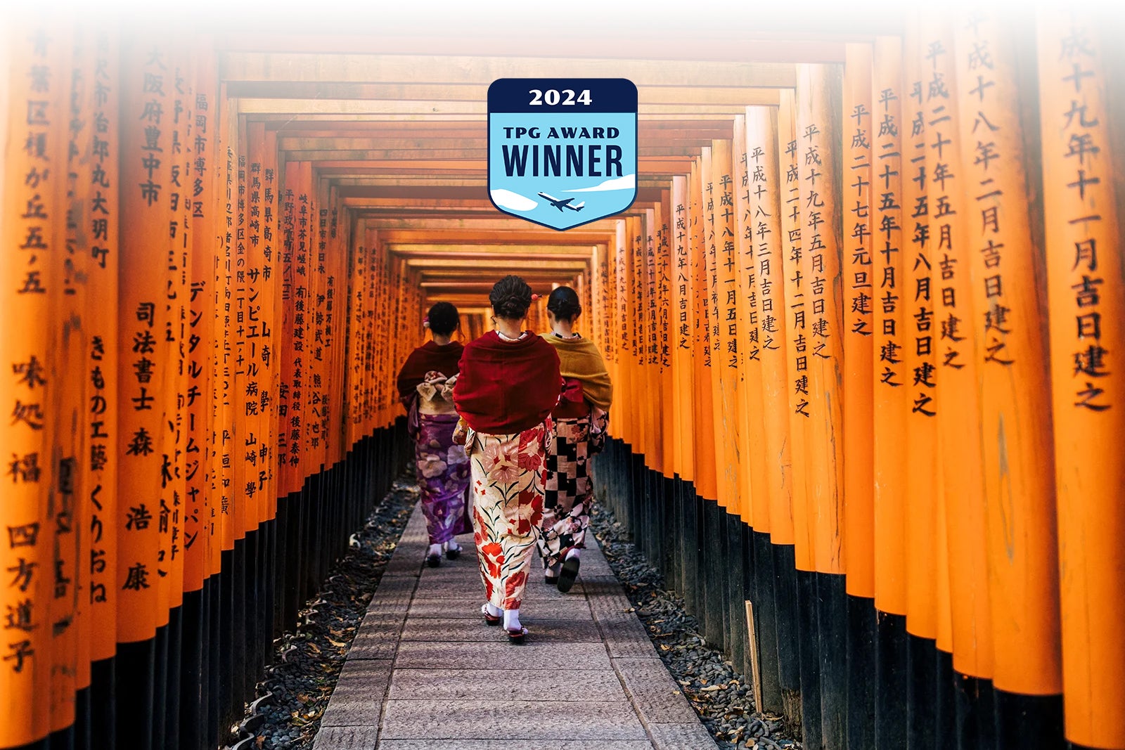 tourists-wearing-kimonos-walk-through-the-torii-gates-at-Fushimi-Inari-Shrine-in-Kyoto_BEHROUZ-MEHRIAFPGetty-Images