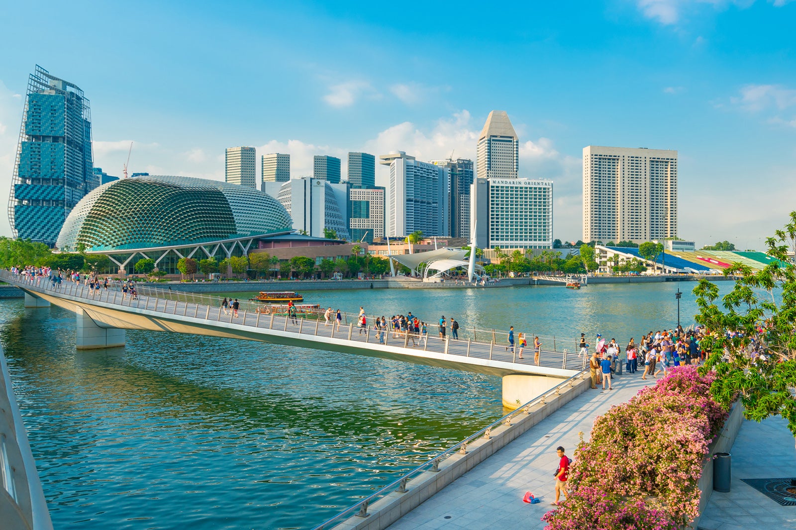 Tourists are enjoying the view of Marina Bay